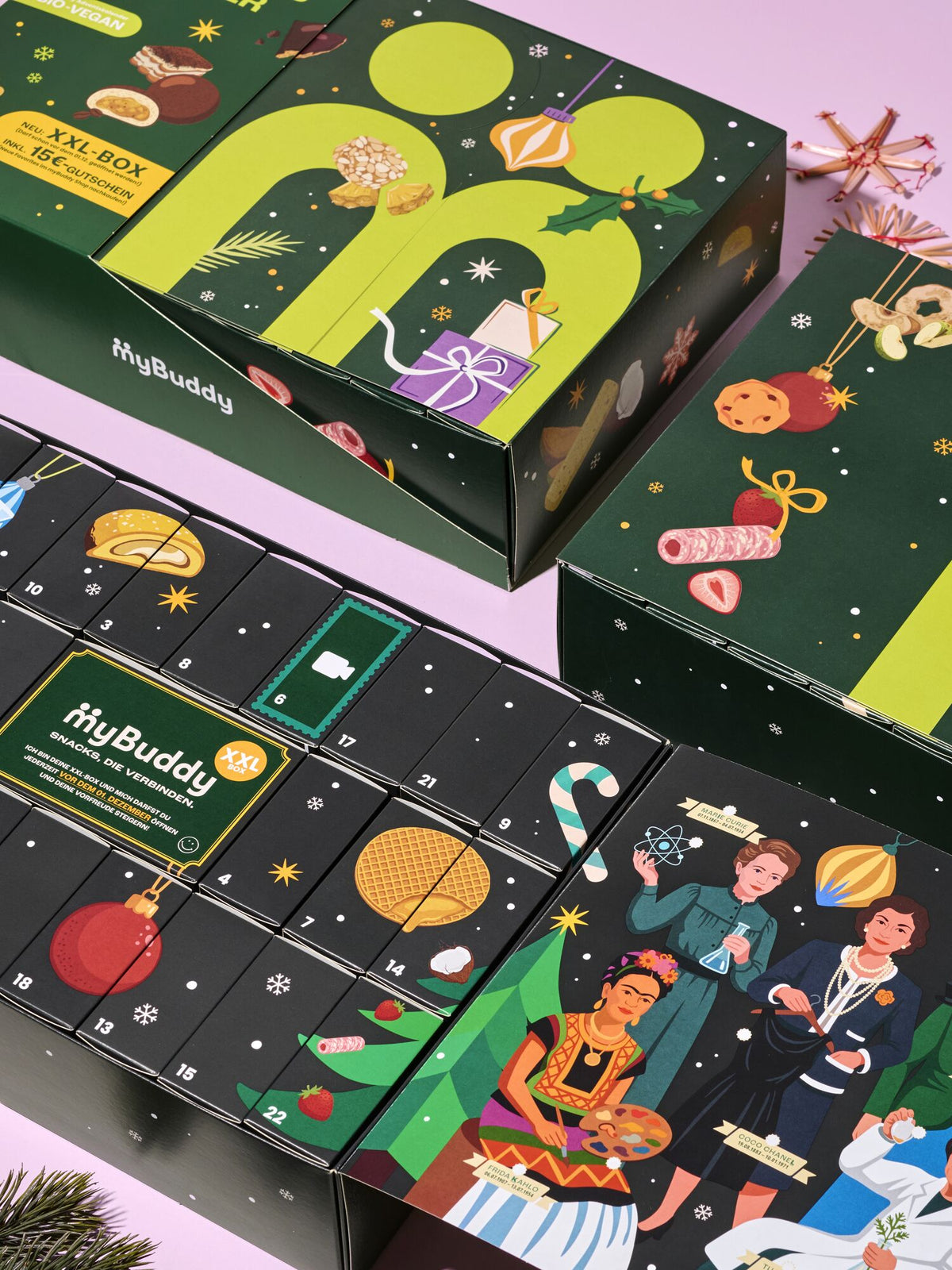 myBuddy Adventskalender 2026, geoeffneter Kalender mit weiteren Verpackungen, lila Hintergrund