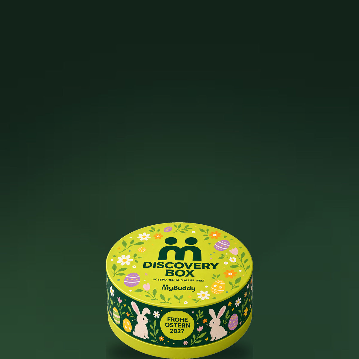 myBuddy Discovery Box Ostern Edition 2027 Dose vor dunkelgruenem Hintergrund